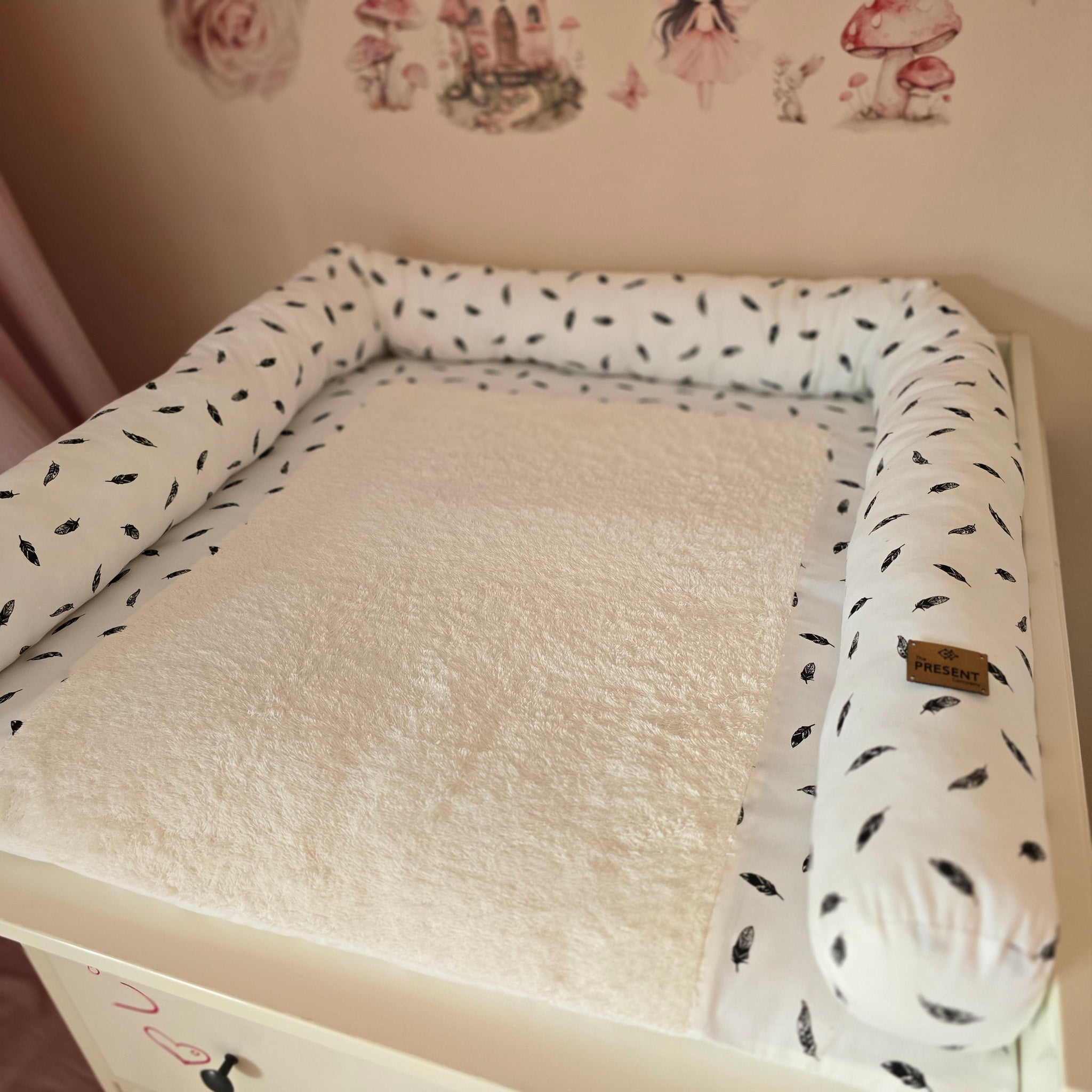 Wickeltischschlange Feder