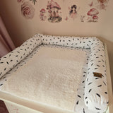 Wickeltischschlange Feder